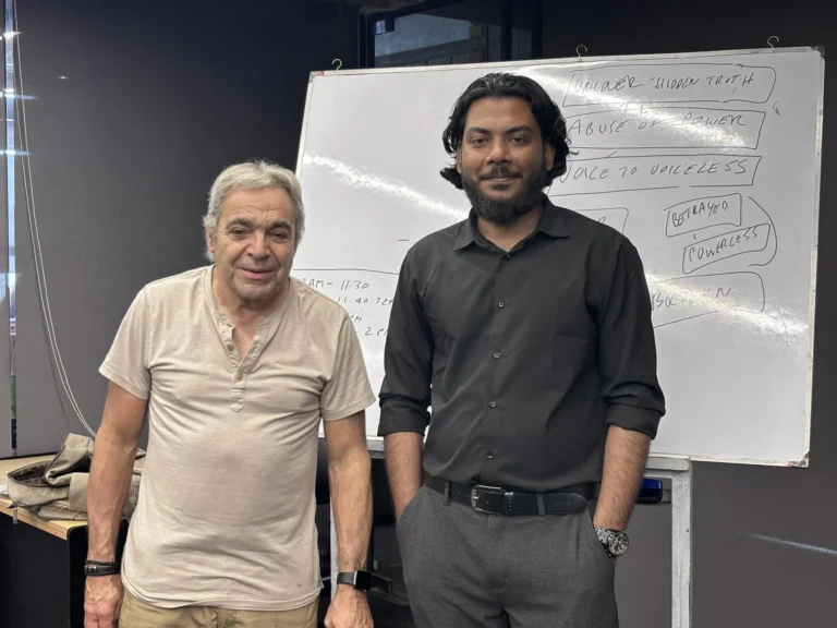 Monowar Hossain interpreting for Canadian investigative journalist Julian Sher at a training session for Bangladeshi reporters in Dhaka